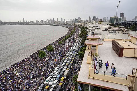 Fans gather ahead of victory parade in Mumbai.